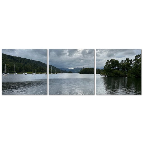 Windermere Lake Landscape Made in UK Triptych Canvas showing three panel lakeside scene with boats wooden rowboats and cloudy sky