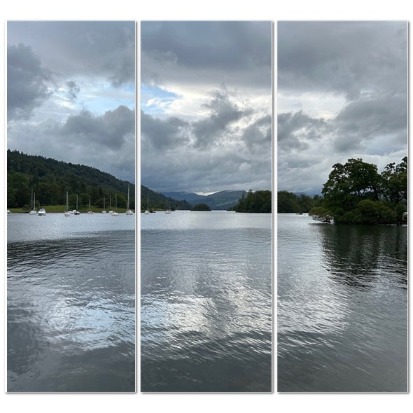 Windermere Lake Landscape Made in UK Triptych Canvas showing wooden rowing boats and motorboats at a cloudy lakeside marina