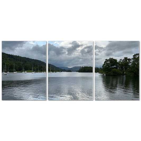 Windermere Lake Landscape Made in UK Triptych Canvas showing wooden rowing boats and motorboats at a cloudy lakeside dock