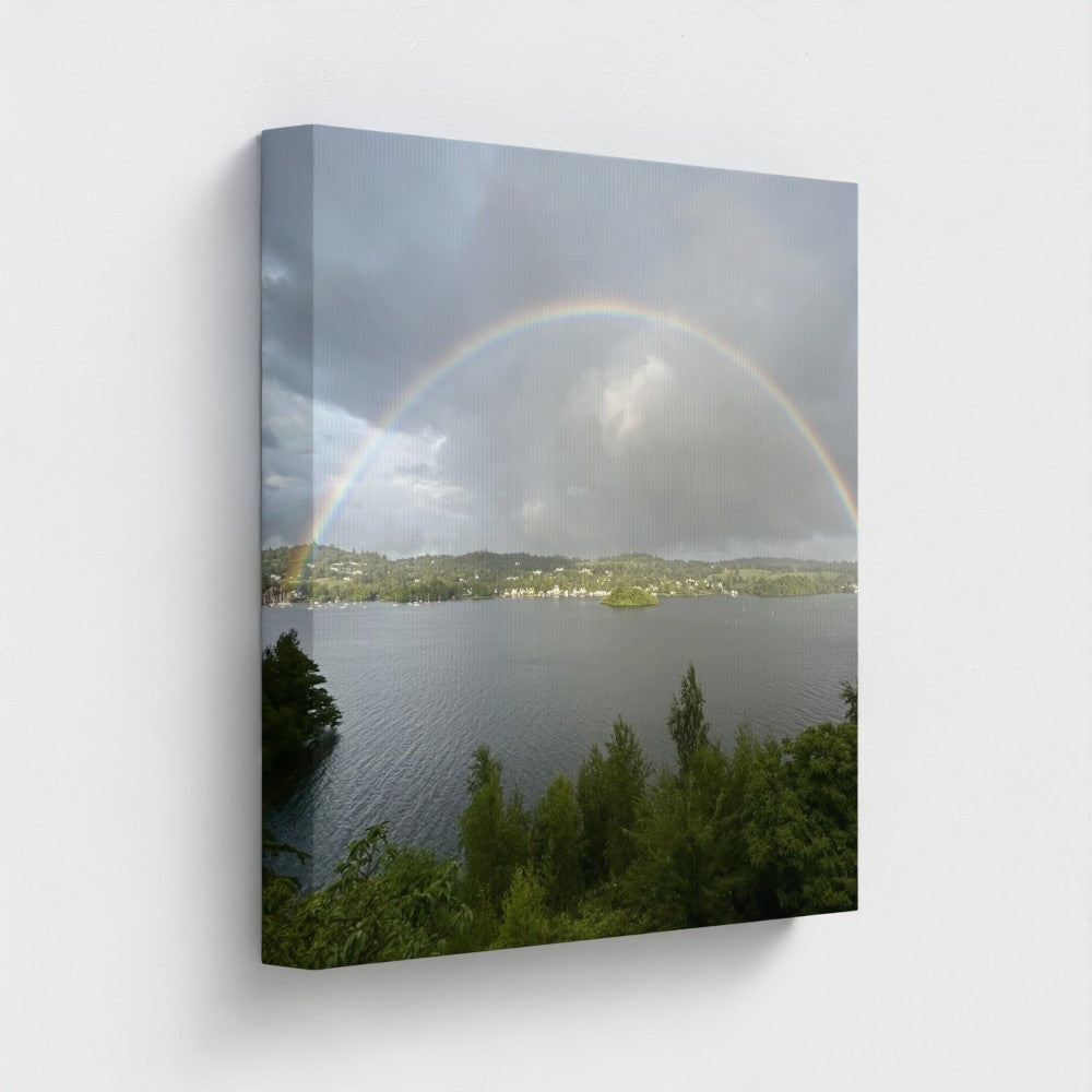 Papi's Canvas Windermere landscape wall decor featuring a lake with trees and a rainbow under cloudy sky